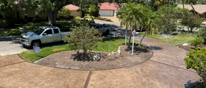 Freshly poured concrete slab curing on residential site